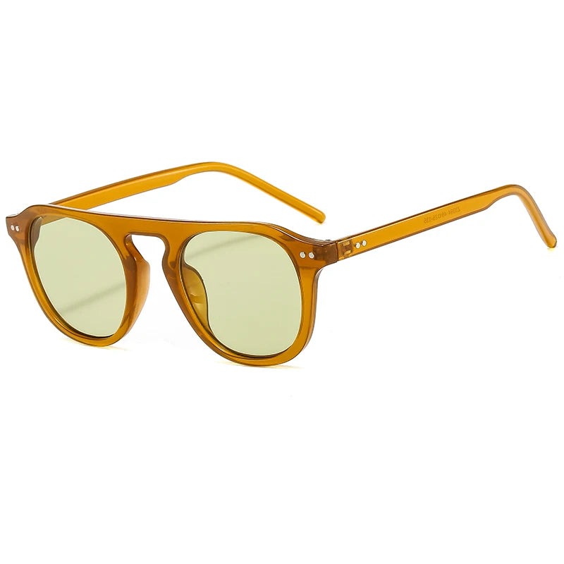Óculos de Sol Ovais Unissexo – Estilo Vintage & Steampunk
Descubra o equilíbrio perfeito entre moda arrojada e atitude rebelde com estes óculos de sol ovais de design vintage. Com um estilo inspirado no steampunk, rebite