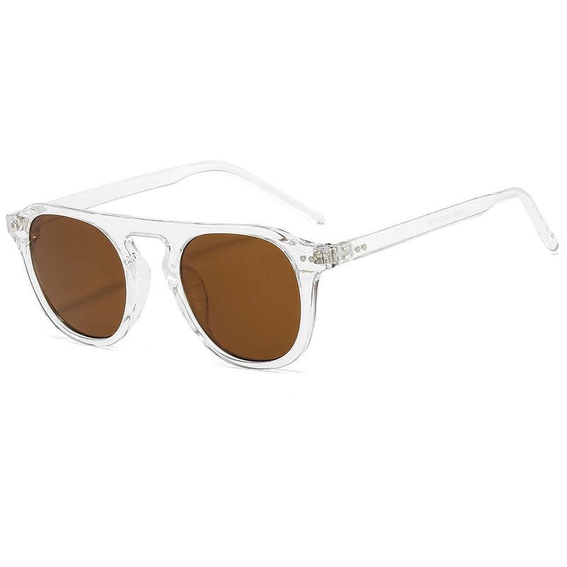 Óculos de Sol Ovais Unissexo – Estilo Vintage & Steampunk
Descubra o equilíbrio perfeito entre moda arrojada e atitude rebelde com estes óculos de sol ovais de design vintage. Com um estilo inspirado no steampunk, rebite