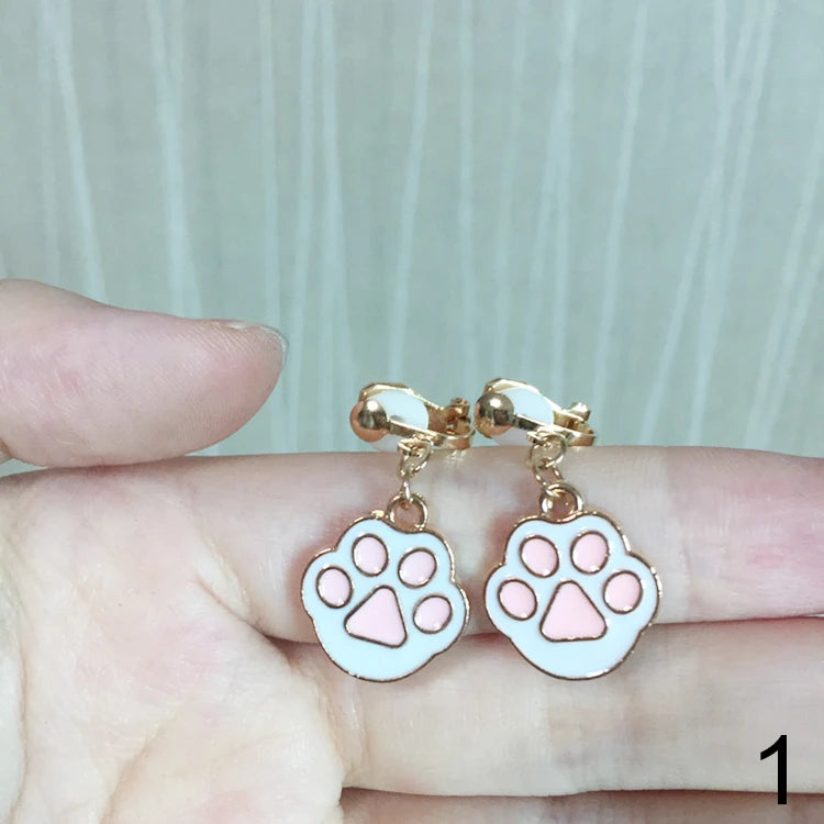Brincos de Pressão em Forma de Estrela e Lua – Para Meninas
Brincos adoráveis em forma de estrela e lua estilo cartoon, perfeitos para meninas que adoram cor, brilho e diversão!
Sem necessidade de furos – com clip de p