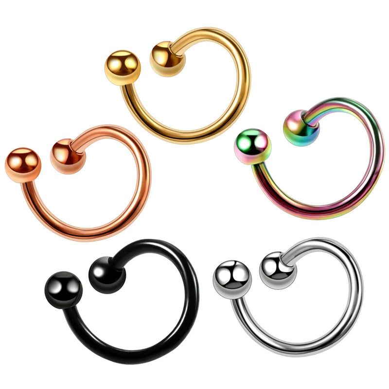 Aro de Nariz em Titânio Preto – Estilo Clicker Sem Emenda
Descubra o equilíbrio perfeito entre estilo e conforto com este aro de nariz sem emenda em aço titânio preto. Versátil e elegante, é ideal para diversas perfur