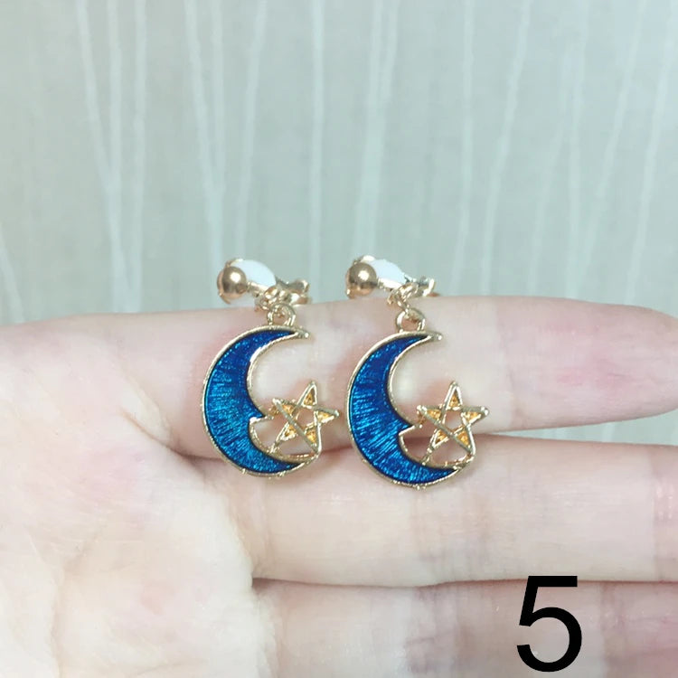 Brincos de Pressão em Forma de Estrela e Lua – Para Meninas
Brincos adoráveis em forma de estrela e lua estilo cartoon, perfeitos para meninas que adoram cor, brilho e diversão!
Sem necessidade de furos – com clip de p