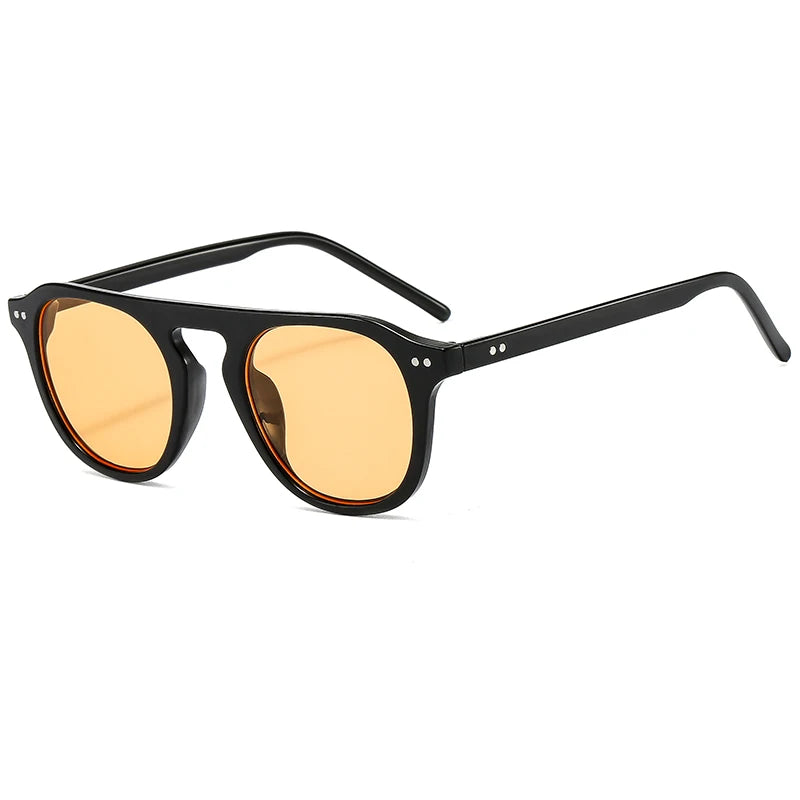 Óculos de Sol Ovais Unissexo – Estilo Vintage & Steampunk
Descubra o equilíbrio perfeito entre moda arrojada e atitude rebelde com estes óculos de sol ovais de design vintage. Com um estilo inspirado no steampunk, rebite