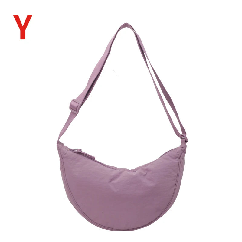 Bolsa Mensageira Feminina em Nylon – Estilo Casual, Grande Capacidade
Descubra a combinação perfeita entre elegância, funcionalidade e conforto com esta bolsa mensageira feminina em nylon de alta qualidade.
Com um design