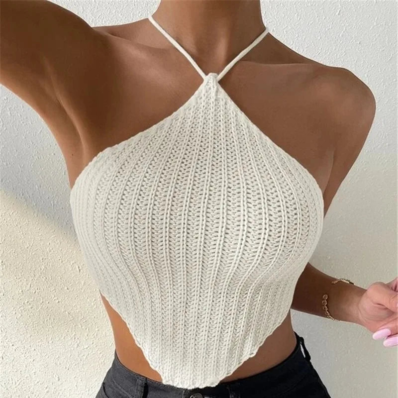 Cropped de Tricô Feminino – Estilo Envolvente com Laço Elegante
Realça o teu look com este cropped de tricô sem mangas, perfeito para os dias mais quentes. Com um design envolvente super feminino e um delicado laço no