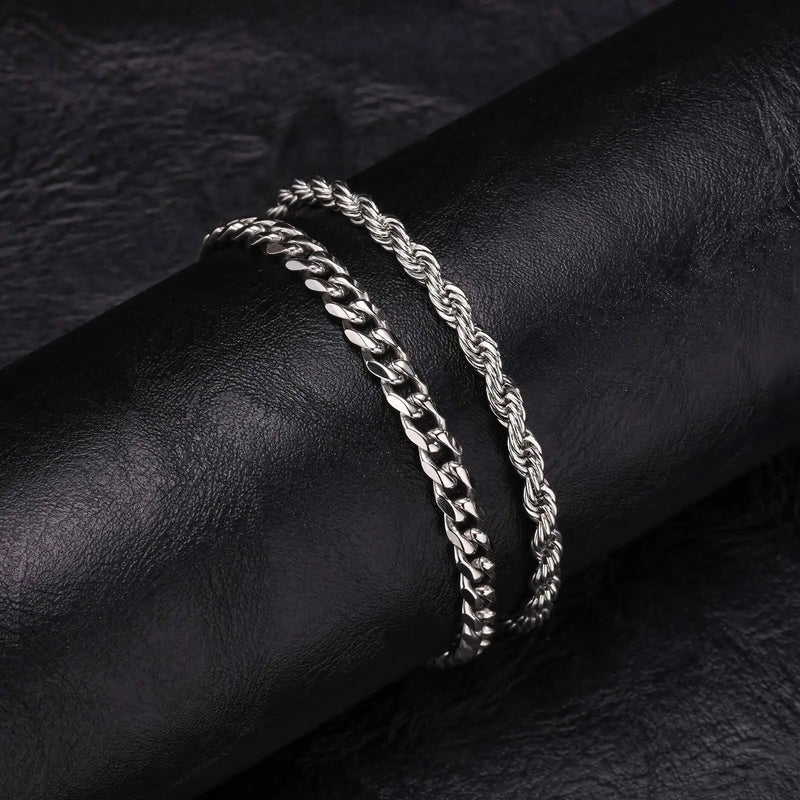 Conjunto de 2 Pulseiras Masculinas – Estilo Cubano Premium
Complete o visual com este conjunto de 2 pulseiras de corrente para homem, disponíveis nas elegantes cores Prata, Ouro e Preto.
Fabricadas em aço inoxidável de a