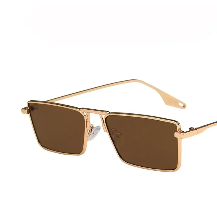 Óculos de Sol Vintage Luxuosos – Estilo Retro com Armação Metálica
Descubra o charme dos óculos de sol estreitos e elegantes, com design retangular vintage que combina estilo e sofisticação. Com armação metálica p