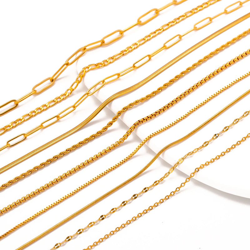 Colar em Aço Inoxidável Dourado 18K – Corrente Ajustável com Design Cruz, Cubana ou Ripple (5 unidades)
Eleve o estilo com este conjunto de colares premium em aço inoxidável, com revestimento PVD em dourado 18K, que ga