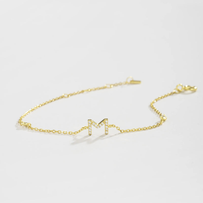 Pulseira Personalizada ANDYWEN com Inicial – Prata Esterlina 925 & Banho de Ouro
Descubra a elegância da joalharia personalizada com a pulseira ANDYWEN — uma peça sofisticada em prata esterlina 925 com banho de ouro bri