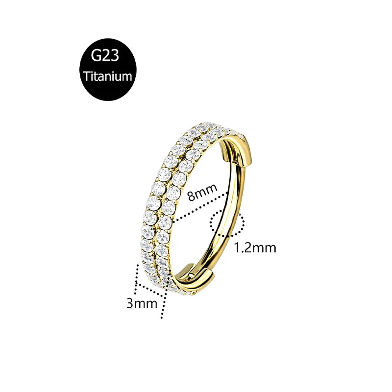 Piercing em Titânio G23 – Argola com Fecho Segmentado e Zircónia CZ (16G)
Versátil e elegante, este piercing é ideal para nariz, cartilagem da orelha, trágus, hélice e daith. Fabricado em titânio cirúrgico G23 — r