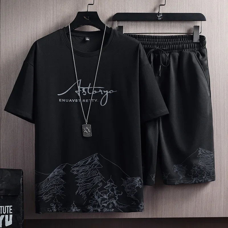 Conjunto Casual Masculino 2 Peças – Camiseta Manga Curta em Seda de Gelo com Estampa Gradient + Shorts Esportivo de Verão

Desfrute do máximo conforto e estilo neste verão com o nosso conjunto masculino casual. A camise