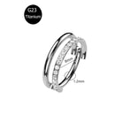 Piercing em Titânio G23 – Argola com Fecho Segmentado e Zircónia CZ (16G)
Versátil e elegante, este piercing é ideal para nariz, cartilagem da orelha, trágus, hélice e daith. Fabricado em titânio cirúrgico G23 — r