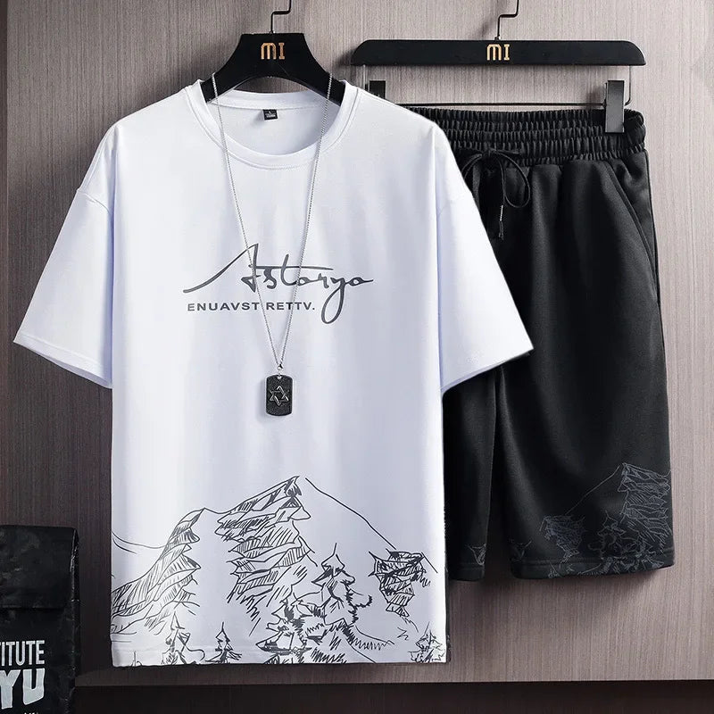 Conjunto Casual Masculino 2 Peças – Camiseta Manga Curta em Seda de Gelo com Estampa Gradient + Shorts Esportivo de Verão

Desfrute do máximo conforto e estilo neste verão com o nosso conjunto masculino casual. A camise