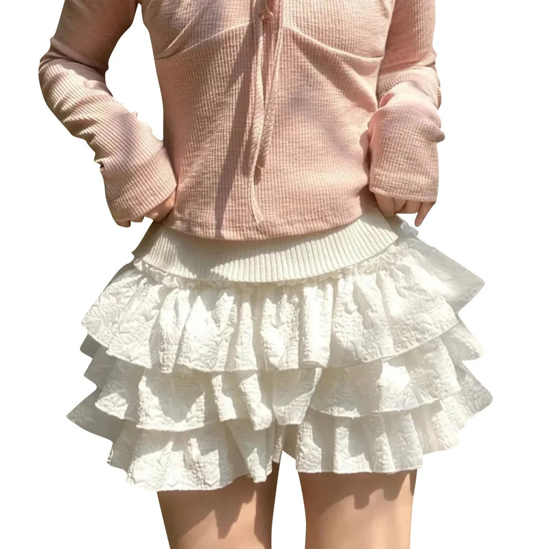 Mini Saia Plissada de Camadas – Estilo Harajuku, Alta Cintura
Dá um toque doce e ousado ao teu visual com esta mini saia de camadas em estilo Harajuku. Com design plissado, cintura subida e corte versátil, é perfeita pa