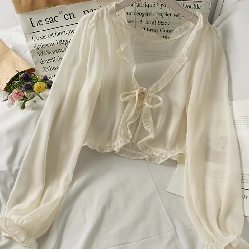 Casaco Feminino de Verão com Proteção Solar – Estilo Coreano Y2K
Leve, elegante e ideal para os dias mais quentes, este casaco/blusa feminina com proteção solar combina conforto e estilo num só look. Com detalhes deli
