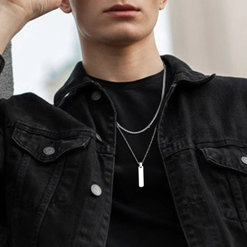 Descrição Melhorada:
Conjunto de Colares Masculinos Estilo Empilhado – Elegância Moderna e Atitude Urbana

Descubra este conjunto exclusivo de colares empilhados para homens e rapazes, que combina uma corrente cubana em