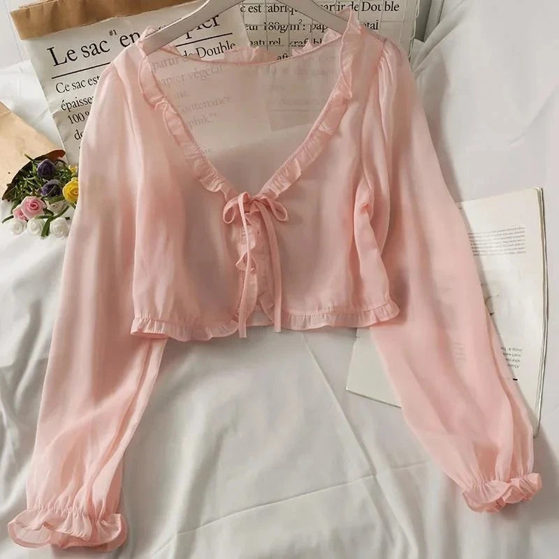 Casaco Feminino de Verão com Proteção Solar – Estilo Coreano Y2K
Leve, elegante e ideal para os dias mais quentes, este casaco/blusa feminina com proteção solar combina conforto e estilo num só look. Com detalhes deli