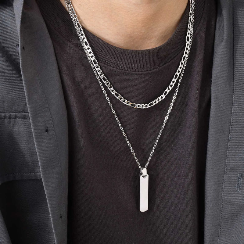 Descrição Melhorada:
Conjunto de Colares Masculinos Estilo Empilhado – Elegância Moderna e Atitude Urbana

Descubra este conjunto exclusivo de colares empilhados para homens e rapazes, que combina uma corrente cubana em
