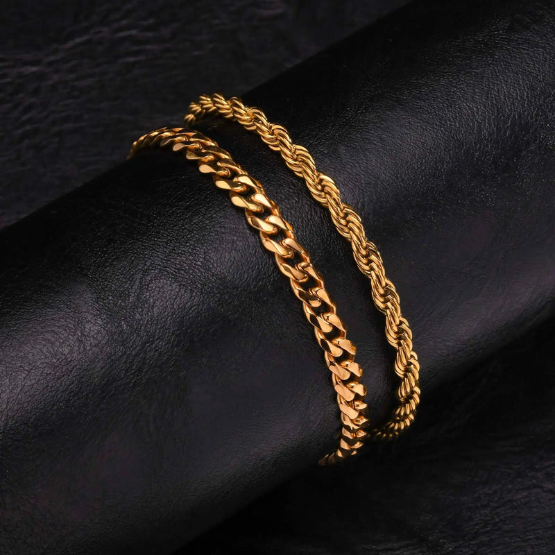Conjunto de 2 Pulseiras Masculinas – Estilo Cubano Premium
Complete o visual com este conjunto de 2 pulseiras de corrente para homem, disponíveis nas elegantes cores Prata, Ouro e Preto.
Fabricadas em aço inoxidável de a