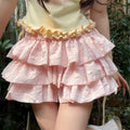 Mini Saia Plissada de Camadas – Estilo Harajuku, Alta Cintura
Dá um toque doce e ousado ao teu visual com esta mini saia de camadas em estilo Harajuku. Com design plissado, cintura subida e corte versátil, é perfeita pa