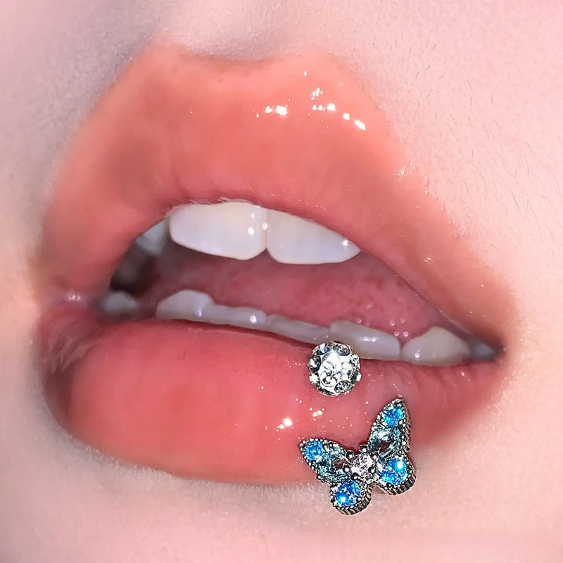 Anel Labial com Borboleta Elegante – Joia Corporal em Titânio Hipoalergénico
Destaque o seu estilo com este anel labial delicado e brilhante, em formato de borboleta, perfeito para quem procura um toque sofisticado e orig