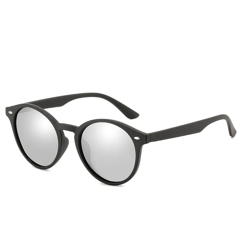 Óculos de Sol Redondos Polarizados – Estilo Clássico Vintage Unissexo
Descubra o equilíbrio perfeito entre estilo intemporal e proteção ocular com estes elegantes óculos de sol redondos, ideais para mulheres e homens.