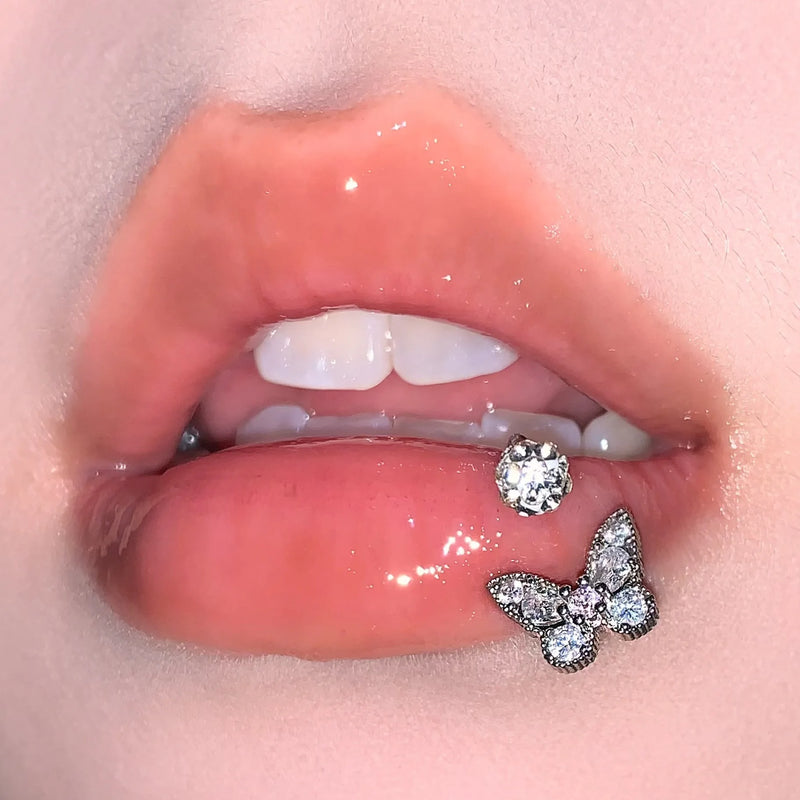 Anel Labial com Borboleta Elegante – Joia Corporal em Titânio Hipoalergénico
Destaque o seu estilo com este anel labial delicado e brilhante, em formato de borboleta, perfeito para quem procura um toque sofisticado e orig