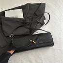 Bolsa Feminina Elegante 2025 – Estilo Retro com Padrão Crocodilo
Descubra a sofisticação da nova tendência de 2025!
Esta bolsa feminina preta combina o charme do design retro com o toque moderno do couro PU texturizado