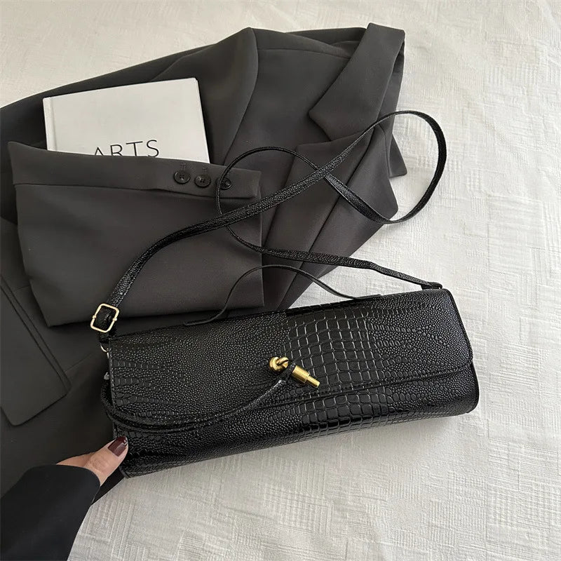 Bolsa Feminina Elegante 2025 – Estilo Retro com Padrão Crocodilo
Descubra a sofisticação da nova tendência de 2025!
Esta bolsa feminina preta combina o charme do design retro com o toque moderno do couro PU texturizado