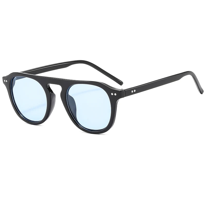 Óculos de Sol Ovais Unissexo – Estilo Vintage & Steampunk
Descubra o equilíbrio perfeito entre moda arrojada e atitude rebelde com estes óculos de sol ovais de design vintage. Com um estilo inspirado no steampunk, rebite