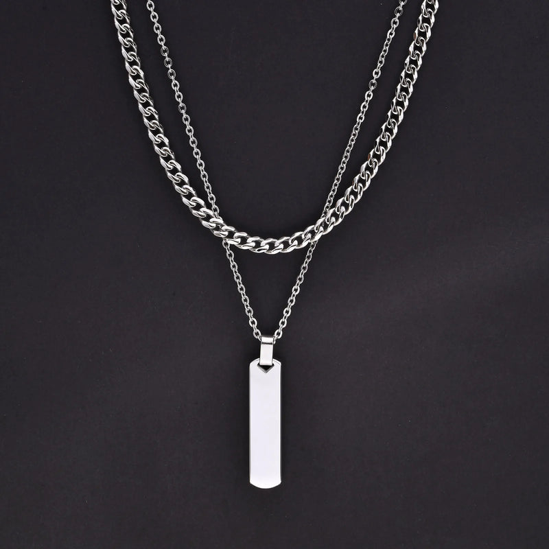 Descrição Melhorada:
Conjunto de Colares Masculinos Estilo Empilhado – Elegância Moderna e Atitude Urbana

Descubra este conjunto exclusivo de colares empilhados para homens e rapazes, que combina uma corrente cubana em
