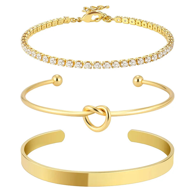 Conjunto de 3 Pulseiras de Aço Inoxidável com Banho de Ouro – Feminino & Ajustável
Descobre o charme deste conjunto luxuoso de 3 pulseiras femininas, confeccionadas em aço inoxidável com banho de ouro, resistente à ox