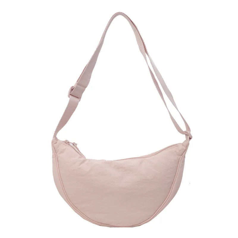 Bolsa Mensageira Feminina em Nylon – Estilo Casual, Grande Capacidade
Descubra a combinação perfeita entre elegância, funcionalidade e conforto com esta bolsa mensageira feminina em nylon de alta qualidade.
Com um design