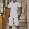 Conjunto masculino de verão 2025 – Camisa de manga curta e calções desportivos
Desenhado para homens ativos, este conjunto combina estilo e conforto com tecidos respiráveis e de secagem rápida. Ideal para os dias quent