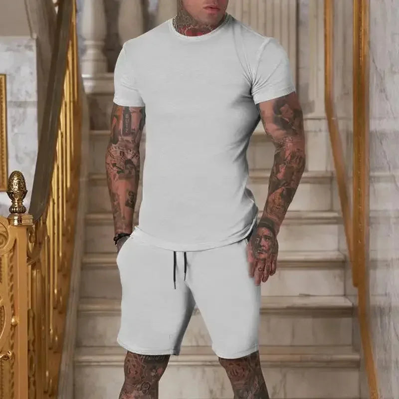 Conjunto masculino de verão 2025 – Camisa de manga curta e calções desportivos
Desenhado para homens ativos, este conjunto combina estilo e conforto com tecidos respiráveis e de secagem rápida. Ideal para os dias quent