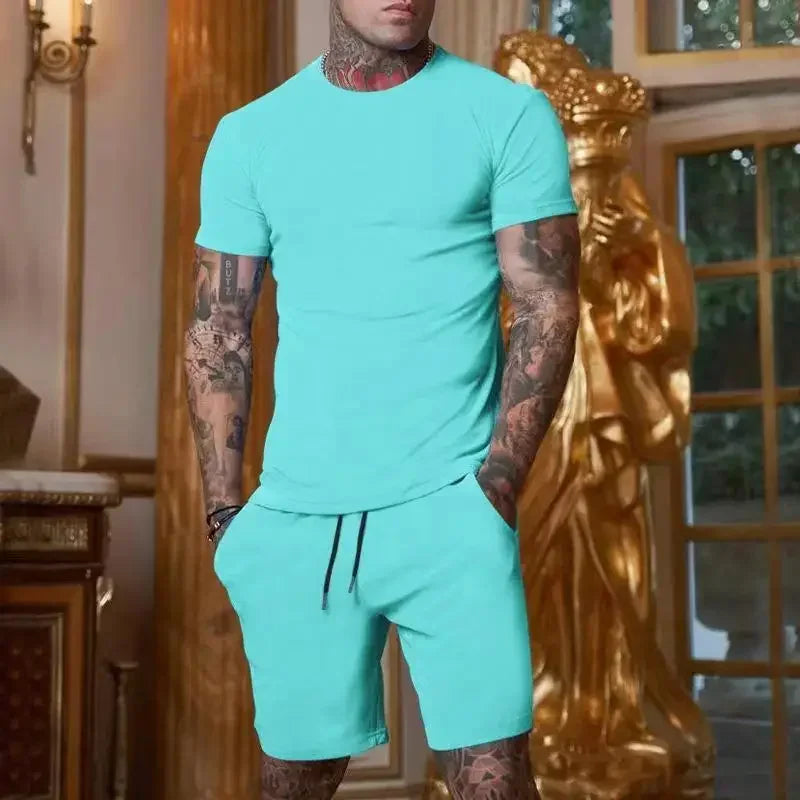 Conjunto masculino de verão 2025 – Camisa de manga curta e calções desportivos
Desenhado para homens ativos, este conjunto combina estilo e conforto com tecidos respiráveis e de secagem rápida. Ideal para os dias quent