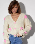Cardigan Feminino “Doce de Morango” – Estilo Coreano, Casual e Confortável
Destaque-se com este encantador cardigan tricotado em 3D com detalhes de morangos, perfeito para quem adora um toque criativo e doce no visual.