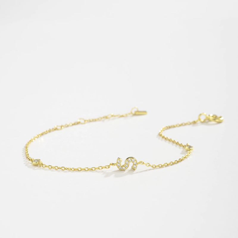 Pulseira Personalizada ANDYWEN com Inicial – Prata Esterlina 925 & Banho de Ouro
Descubra a elegância da joalharia personalizada com a pulseira ANDYWEN — uma peça sofisticada em prata esterlina 925 com banho de ouro bri