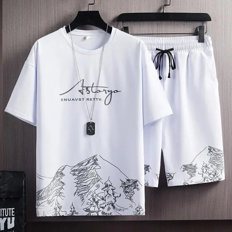 Conjunto Casual Masculino 2 Peças – Camiseta Manga Curta em Seda de Gelo com Estampa Gradient + Shorts Esportivo de Verão

Desfrute do máximo conforto e estilo neste verão com o nosso conjunto masculino casual. A camise