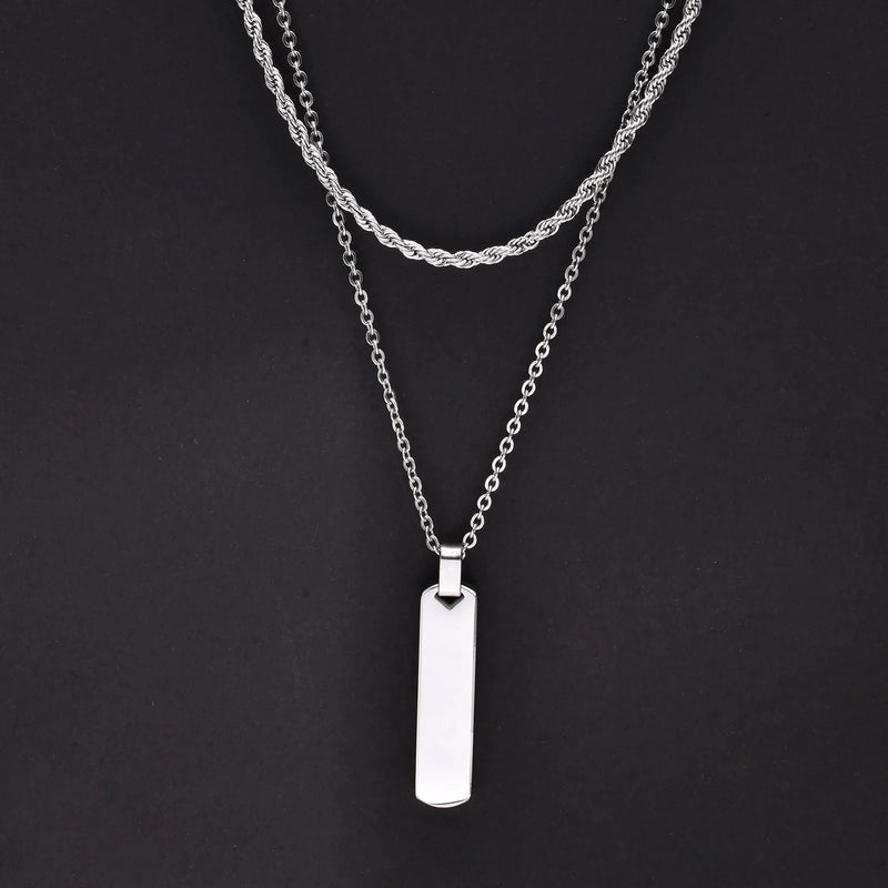Descrição Melhorada:
Conjunto de Colares Masculinos Estilo Empilhado – Elegância Moderna e Atitude Urbana

Descubra este conjunto exclusivo de colares empilhados para homens e rapazes, que combina uma corrente cubana em