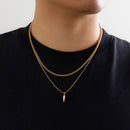 Conjunto de 2 Colares KunJoe – Estilo Punk Masculino
Destaque-se com atitude e estilo urbano.
Este conjunto inclui dois colares distintos em aço inoxidável:

1 Cuban Choker com elos largos

1 Colar com pingente de rebite