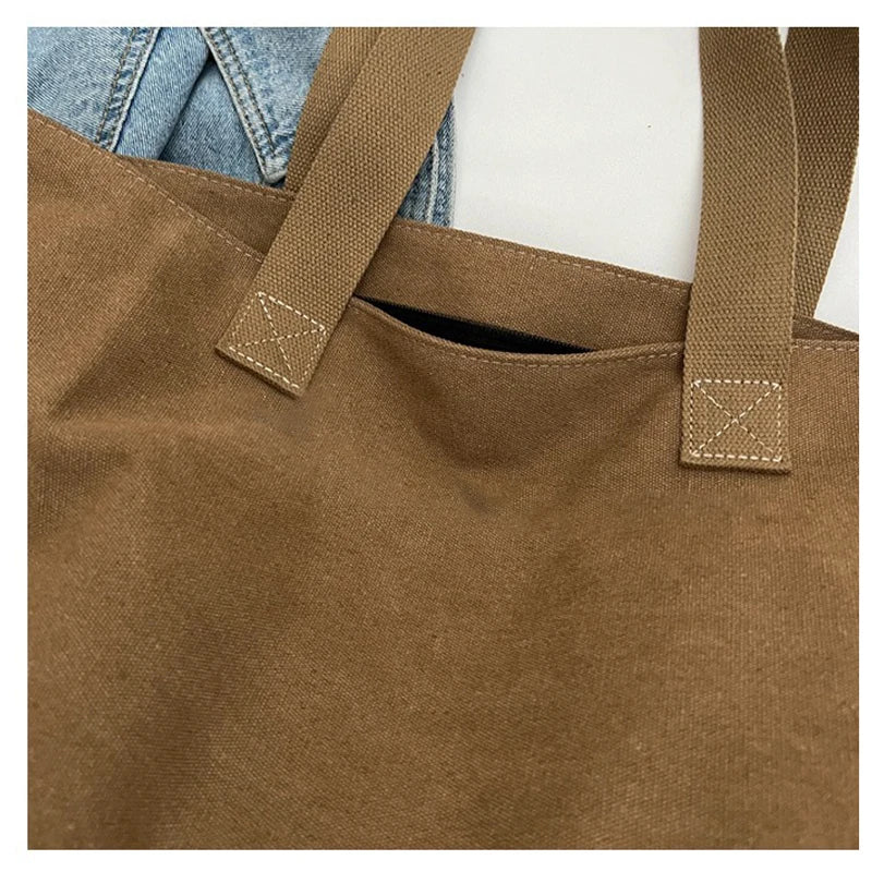 Bolsa Tote de Lona Feminina – Elegância e Praticidade para o Seu Dia a Dia

Descubra a combinação perfeita entre estilo e funcionalidade com esta Bolsa Tote de Lona, desenhada especialmente para mulheres modernas que val