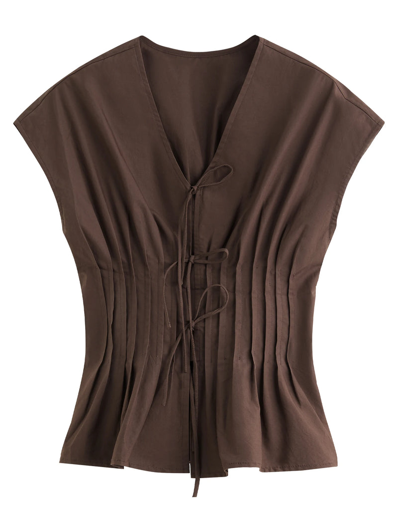 Blusa Feminina FSLE com Laço Sofisticado e Decote em V – Verão 2025
Modelo: 25FS12737

Descubra o charme da elegância moderna com esta blusa feminina da FSLE, ideal para ocasiões especiais e visuais requintados. Com um