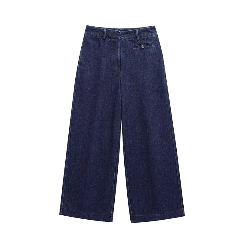 Conjunto Feminino em Denim Azul Escuro – Estilo Retrô & Streetwear
Destaque-se com este conjunto feminino 2 em 1 em jeans azul escuro com design retrô e toque moderno. O look combina um colete cropped com lapela e mangas