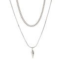 Conjunto de 2 Colares KunJoe – Estilo Punk Masculino
Destaque-se com atitude e estilo urbano.
Este conjunto inclui dois colares distintos em aço inoxidável:

1 Cuban Choker com elos largos

1 Colar com pingente de rebite