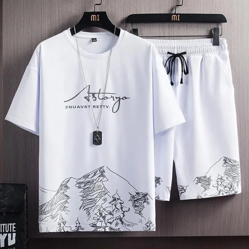 Conjunto Casual Masculino 2 Peças – Camiseta Manga Curta em Seda de Gelo com Estampa Gradient + Shorts Esportivo de Verão

Desfrute do máximo conforto e estilo neste verão com o nosso conjunto masculino casual. A camise