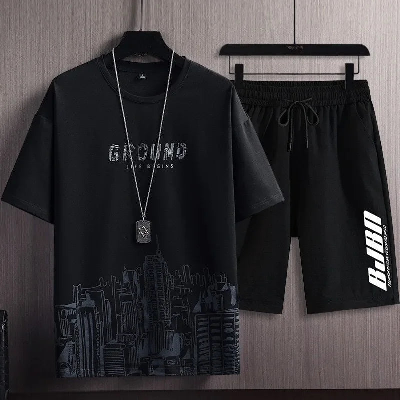 Conjunto Casual Masculino 2 Peças – Camiseta Manga Curta em Seda de Gelo com Estampa Gradient + Shorts Esportivo de Verão

Desfrute do máximo conforto e estilo neste verão com o nosso conjunto masculino casual. A camise